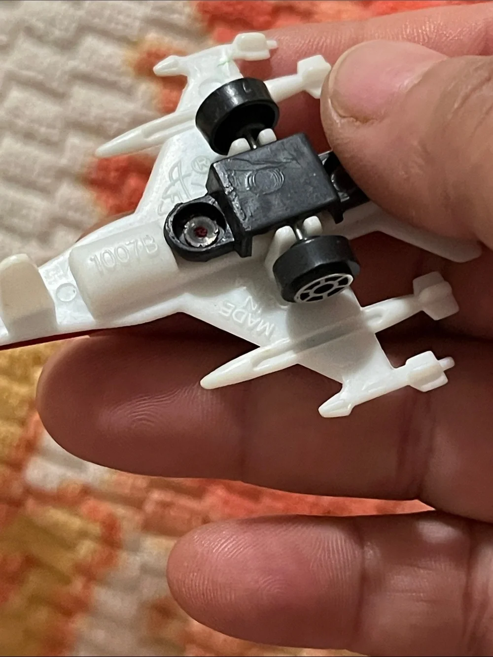 Vintage Red & White Toy Jet with Yellow and Black Race Cars